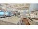 Spacious open-concept kitchen with stone countertops, stainless appliances, and a beautiful view at 7706 Desoto Memorial Hwy, Bradenton, FL 34209
