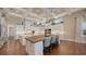 A bright, expansive kitchen featuring a large island, modern appliances, and plenty of cabinet space at 7706 Desoto Memorial Hwy, Bradenton, FL 34209