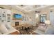 Elegant living room with coffered ceilings, stone fireplace, and custom built-ins at 7706 Desoto Memorial Hwy, Bradenton, FL 34209