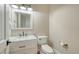 Elegant powder room featuring a marble countertop vanity and modern fixtures at 7706 Desoto Memorial Hwy, Bradenton, FL 34209