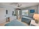 Charming bedroom with ceiling fan, and a bright and airy feel at 8735 Olde Hickory Ave # 8303, Sarasota, FL 34238