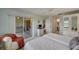 Bright bedroom with an attached seating area and an ensuite bathroom at 8735 Olde Hickory Ave # 8303, Sarasota, FL 34238