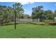 Stoneybrook Golf & Country Club sign surrounded by lush green landscaping at 8735 Olde Hickory Ave # 8303, Sarasota, FL 34238