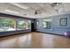 Fitness studio space featuring a ballet bar, weights and a view of the pool at 8735 Olde Hickory Ave # 8303, Sarasota, FL 34238