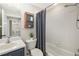 Bathroom featuring a vanity, mirror, toilet and a shower with curtain at 923 Fairwaycove Ln # 103, Bradenton, FL 34212