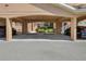 Assigned carport parking under building with unit numbers at 923 Fairwaycove Ln # 103, Bradenton, FL 34212