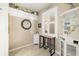 Light-filled dining area with a window with shutters and a decorative shelf at 923 Fairwaycove Ln # 103, Bradenton, FL 34212