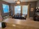 This dining area is equipped with large windows to allow natural light to flow through the space at 1155 Millbrook Cir, Bradenton, FL 34212