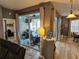 Inviting interior view showcasing living space with sliding glass doors, neutral paint tones, and an open layout at 1155 Millbrook Cir, Bradenton, FL 34212
