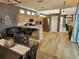 Open concept living space features updated kitchen, dining area and living room for easy entertaining at 1155 Millbrook Cir, Bradenton, FL 34212
