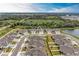 Street view showcasing several new construction homes with neatly kept lawns and neighborhood landscaping at 12476 Oak Hill Way, Parrish, FL 34219