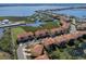 Beautiful aerial showcases the waterfront community with scenic views of a bay and boat docks at 1318 3Rd Street E Cir, Palmetto, FL 34221
