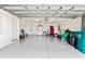 A well-lit two car garage offering ample space for vehicles and storage at 1318 3Rd Street E Cir, Palmetto, FL 34221