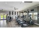 Bright gym with modern equipment, ceiling fans, and scenic windows at 1318 3Rd Street E Cir, Palmetto, FL 34221