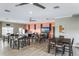Large community recreation room featuring tables, chairs, and a large television at 1318 3Rd Street E Cir, Palmetto, FL 34221