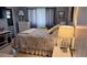 Serene bedroom with soft lighting, neutral tones, and a comfortable bed at 14 Strathmore Blvd # 14, Sarasota, FL 34233
