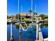 This waterfront property has a private dock with a boat lift providing direct access to the open water at 1428 Pine Island Ct, Punta Gorda, FL 33950