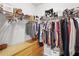 Walk-in closet with shelving, hanging rods, and drawers for ample storage space at 1524 Remington Trace Dr, Port Charlotte, FL 33953