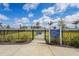 Fenced community dog park with separate areas for small and large dogs, ensuring a safe and enjoyable space at 1524 Remington Trace Dr, Port Charlotte, FL 33953