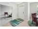 Inviting foyer with tile flooring, leading to a living space with comfortable seating at 1524 Remington Trace Dr, Port Charlotte, FL 33953
