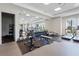 Bright gym with free weights, machines, and mirrors, creating an invigorating workout environment at 1524 Remington Trace Dr, Port Charlotte, FL 33953