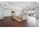 Comfortable lounge with elegant seating, tray ceiling, and abundant natural light showcasing a relaxing community space at 1524 Remington Trace Dr, Port Charlotte, FL 33953