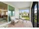 Relaxing screened-in patio with brick flooring and comfortable seating at 1524 Remington Trace Dr, Port Charlotte, FL 33953