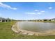 Beautiful view of the pond and surrounding community at 1524 Remington Trace Dr, Port Charlotte, FL 33953