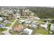 Aerial view of houses in the community near the water and lush landscapes at 1582 Overbrook Rd, Englewood, FL 34223