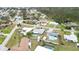 Aerial view of homes in a beautiful neighborhood with mature trees and lush landscaping at 1582 Overbrook Rd, Englewood, FL 34223
