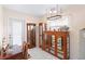 Cozy dining area with classic wood display cases and tile flooring at 1582 Overbrook Rd, Englewood, FL 34223