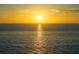 Golden sunset reflecting on the tranquil ocean, creating a picturesque and serene view at 1582 Overbrook Rd, Englewood, FL 34223