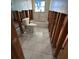 Bathroom featuring a toilet, tub, and a window bringing in natural light, currently undergoing renovations at 1782 Mississippi Ne Ave, St Petersburg, FL 33703