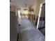 Open-concept dining area featuring exposed framing, with a view of adjacent rooms at 1782 Mississippi Ne Ave, St Petersburg, FL 33703