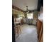 Kitchen renovation in progress with open framing and a stool in the foreground at 1782 Mississippi Ne Ave, St Petersburg, FL 33703