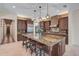 Beautiful kitchen with brick accents, a granite island, and stainless steel appliances at 1813 Boyce St, Sarasota, FL 34239