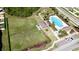 Birds-eye view of community amenities including pool, dog park, playground, and parking area at 1819 Redmond Brook Ln, Ruskin, FL 33570