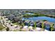 A beautiful aerial view of a home in a well-developed community surrounded by serene ponds at 1819 Redmond Brook Ln, Ruskin, FL 33570
