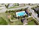 An aerial view of the community pool and surrounding playground at 1819 Redmond Brook Ln, Ruskin, FL 33570