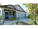 Charming single-Gathering home with a two-car garage, manicured landscaping, and a welcoming front entrance at 1819 Redmond Brook Ln, Ruskin, FL 33570