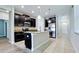 Modern kitchen with stainless steel appliances and a center island at 1819 Redmond Brook Ln, Ruskin, FL 33570