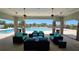 Inviting pool area with comfortable seating, perfect for relaxation and socializing at 1819 Redmond Brook Ln, Ruskin, FL 33570