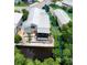 Aerial view of a home on a canal surrounded by lush greenery at 3333 26Th E Ave # 1025, Bradenton, FL 34208