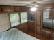 Bedroom features a closet, built-in drawers and TV, and a large mirror at 3333 26Th E Ave # 1025, Bradenton, FL 34208