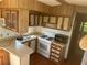 Well-equipped kitchen featuring a gas range and plenty of counter space for meal preparation at 3333 26Th E Ave # 1025, Bradenton, FL 34208