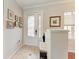 Inviting foyer with tile flooring, decorative glass door, and sidelight allowing natural light at 368 Snapdragon Loop, Bradenton, FL 34212