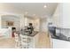 Well-equipped kitchen featuring granite countertops, stainless steel appliances, and a breakfast bar at 368 Snapdragon Loop, Bradenton, FL 34212