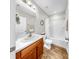 Cozy bathroom featuring wood-look vinyl floors and a shower-tub combo at 3708 Wayfarer Way, Palmetto, FL 34221