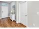Inviting entryway with hardwood floors, neutral paint and a view of an outside door at 3708 Wayfarer Way, Palmetto, FL 34221