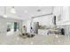 Modern kitchen with stainless steel appliances and granite countertops at 3708 Wayfarer Way, Palmetto, FL 34221